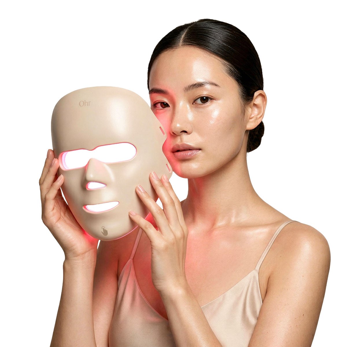 Woman holding the LED light therapy mask